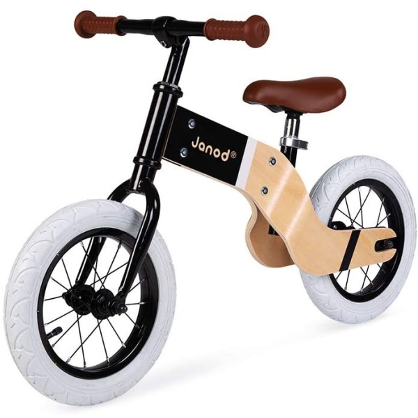 This magnificent balance bike succeeds in combining wood and metal and adopting a half biker, half vintage style which is completely original! One thing is sure, little ones won't go unnoticed when riding this superb balance bike for children from 3 years old! The front part is made of metal with a black paint finish for a very refined look. The rest of the bike is made of wood. Under the seat, it is curved to fit the rear wheel and to give a design style to the whole. The structure reveals the natural wood for an authentic effect. The black wheels with white tyres are a perfect match for this Deluxe Bike. Finally, the comfortable silicone grips and the seat are matched in the same natural warm brown colour. In addition to allowing little ones to follow the family on a ride, balance bikes have an undeniable advantage: they make it easier to learn how to ride a bike without wheels! This beautiful bi-material bike will also help your child to develop his/her coordination. The adjustable seat adapts to the child's height as they grow (from 40 to 46 cm/15.7 to 18.1"). The tyres are inflatable for extra comfort!  3-6 yo Product info  Dimensions 87 x 42 x 55 cm (34.2 x 16.53 x 21.65") Material(s) Wood, metal Maximum weight 30 kg (66,13 lbs) Assembly time 20 minutes